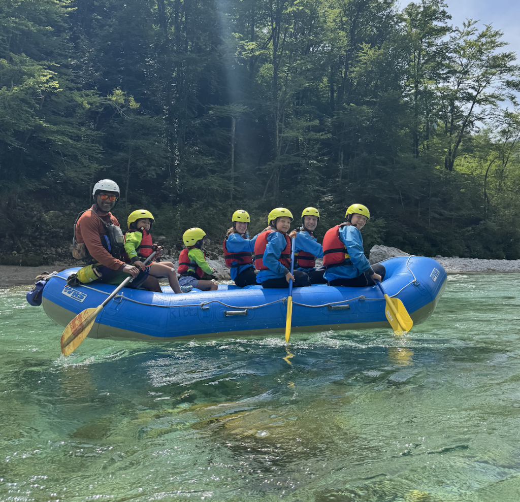 Family-friendly rafting on the emerald Soča River from Čezsoča to Boka, with child-sized gear and expert guides.
